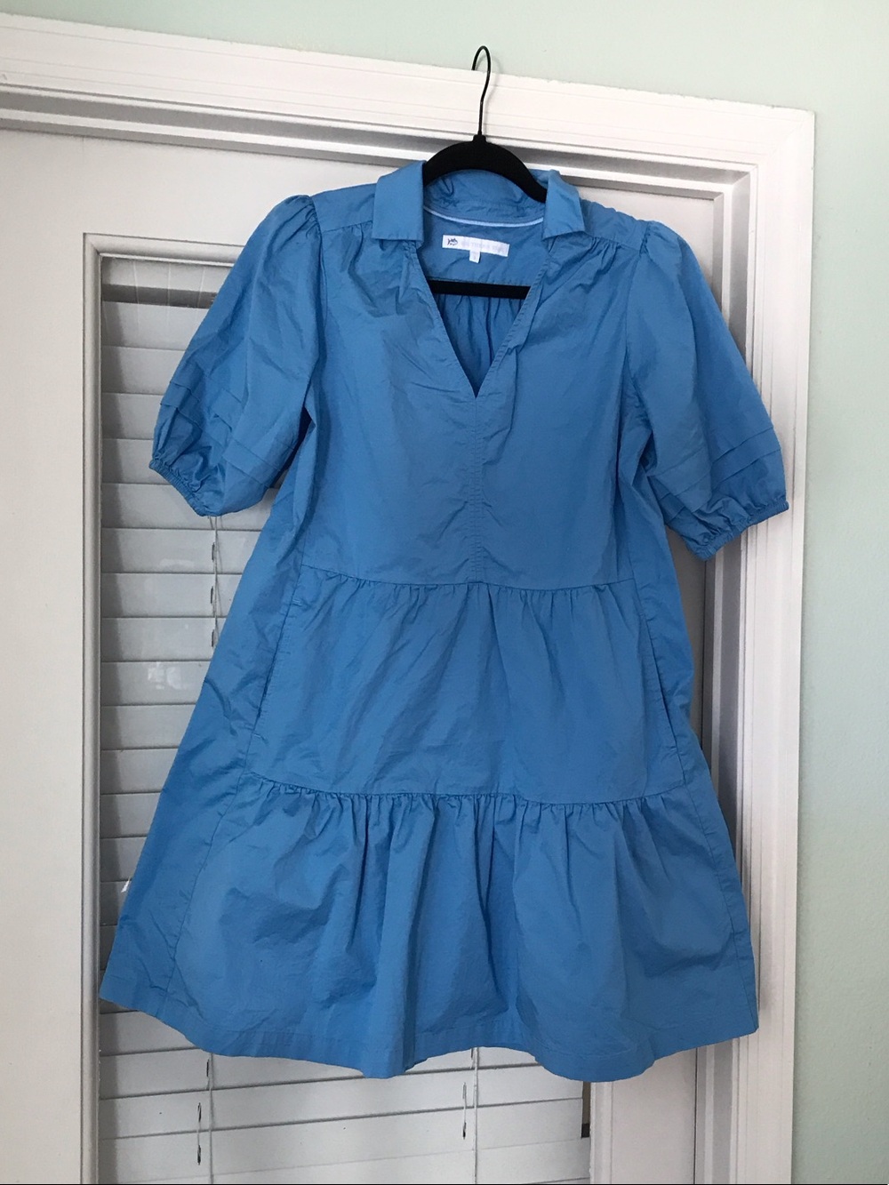Woman’s hydrangea blue dress